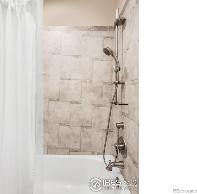 full bathroom with shower / bath combination with curtain