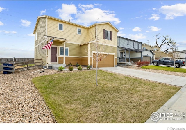 view of front of home featuring concrete driveway and an attached garage