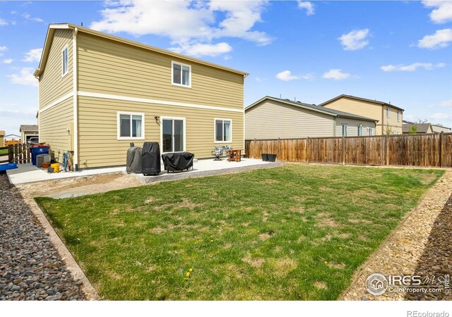 rear view of house with a patio area