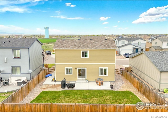 1246 Sherman Dr, Dacono, CO 80514 - rear view of property featuring entry steps, a patio area, and a residential view