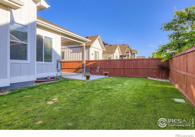 2004 Day Spring Dr, Windsor, CO 80550 - fenced backyard with a patio area