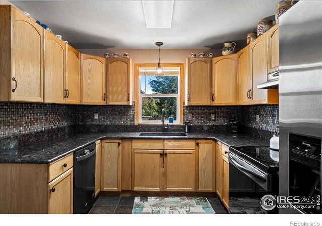 719 Marshall Pl, Berthoud, CO 80513 - kitchen featuring a sink, black appliances, exhaust hood, backsplash, and pendant lighting