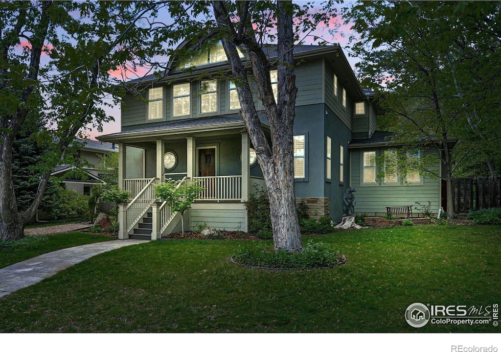 3219 7th St, Boulder, CO 80304 - traditional style home featuring a porch, stairs, and stucco siding