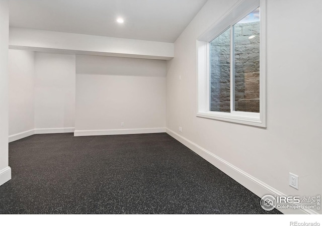 951 Warbling Dr, Windsor, CO 80550 - below grade area featuring baseboards and recessed lighting