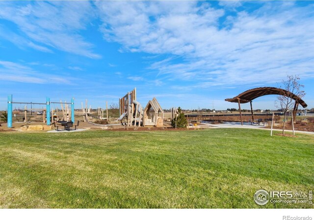 951 Warbling Dr, Windsor, CO 80550 - view of playground with a yard