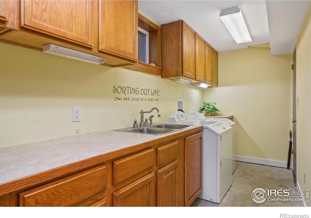 5930 Mars Dr, Fort Collins, CO 80525 - clothes washing area featuring cabinet space and washer and dryer