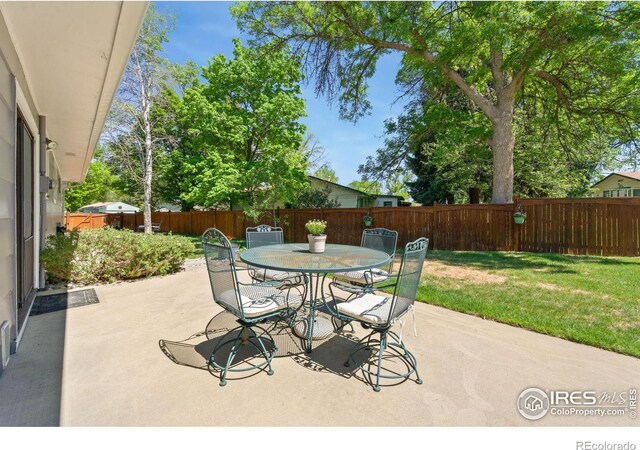 5930 Mars Dr, Fort Collins, CO 80525 - view of patio / terrace featuring outdoor dining area