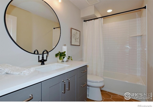 bathroom featuring toilet, vanity, tile patterned flooring, shower / tub combo, and recessed lighting