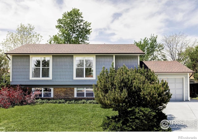 1013 Alsace Way, Lafayette, CO 80026 - view of front facade with concrete driveway, a front lawn, a garage, brick siding, and a shingled roof