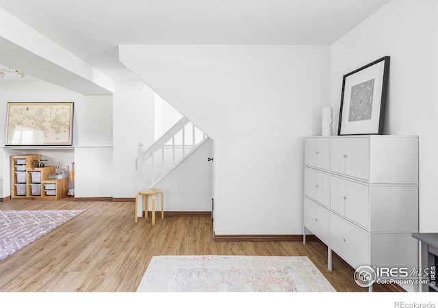 1013 Alsace Way, Lafayette, CO 80026 - interior space with wood finished floors, baseboards, and stairs