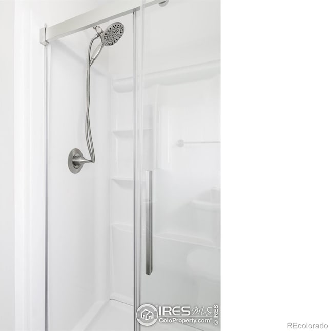 1013 Alsace Way, Lafayette, CO 80026 - bathroom featuring a shower stall
