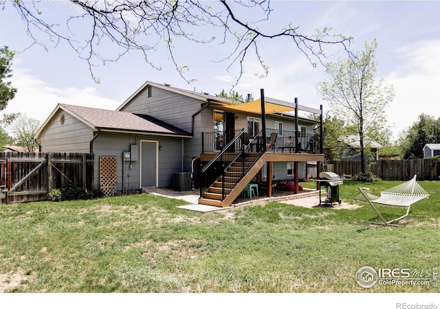 1013 Alsace Way, Lafayette, CO 80026 - rear view of property with stairs, a wooden deck, and central AC unit