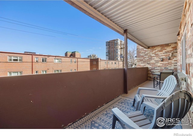 view of patio / terrace with a balcony