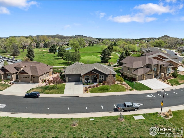 660 Deer Meadow Dr, Loveland, CO 80537 - aerial view of residential area with a local golf course and a mountain backdrop