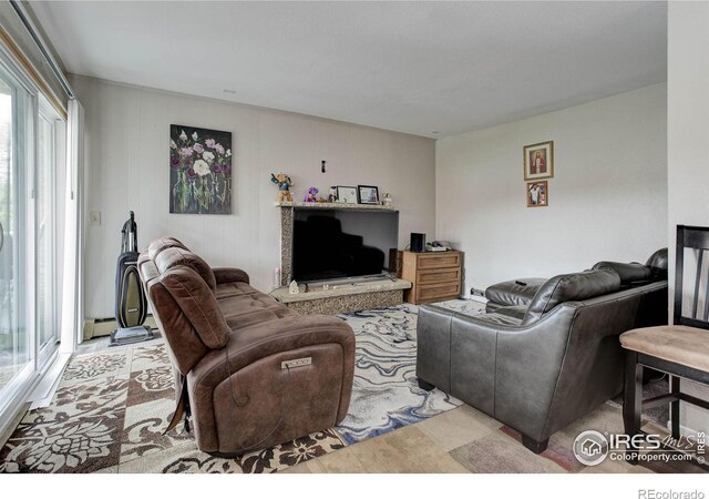 3030 Oneal Pkwy Unit 10, Boulder, CO 80301 - living room featuring plenty of natural light and baseboard heating