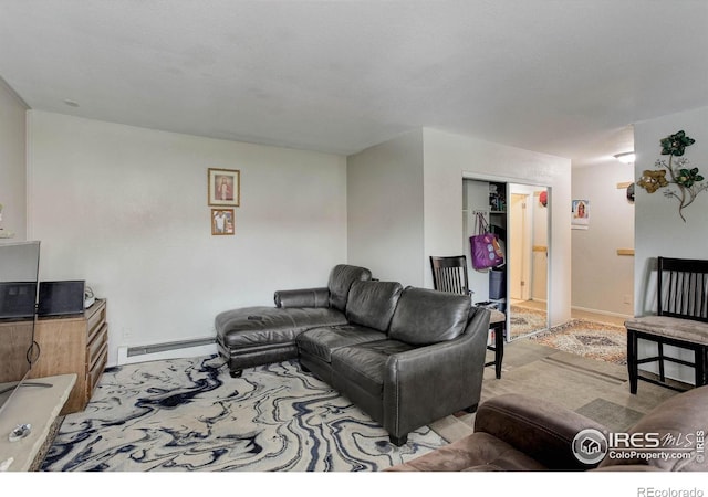 3030 Oneal Pkwy Unit 10, Boulder, CO 80301 - living area with a baseboard radiator, light colored carpet, and baseboards