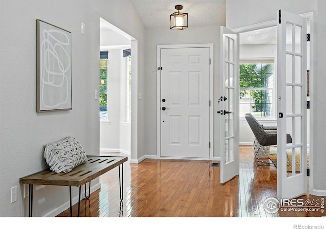 1970 Hamron Ct, Erie, CO 80516 - entryway with light wood-style floors, baseboards, and french doors