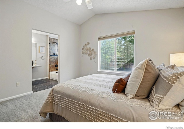 1970 Hamron Ct, Erie, CO 80516 - carpeted bedroom with lofted ceiling, baseboards, connected bathroom, and ceiling fan