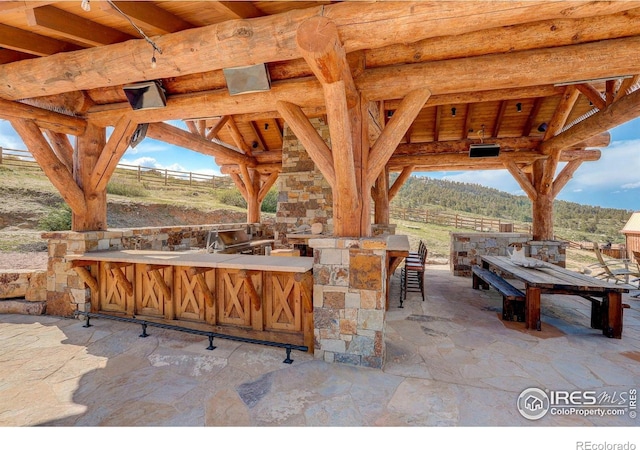 9126 Gold Mine Rd, Loveland, CO 80538 - view of patio / terrace with a gazebo and a mountain view