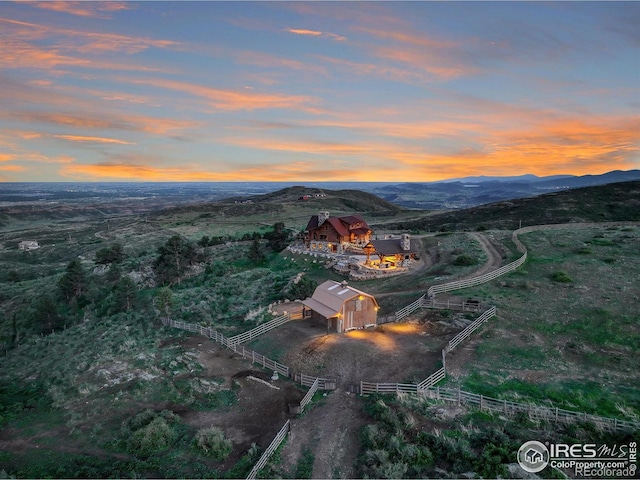 9126 Gold Mine Rd, Loveland, CO 80538 - aerial view of property and surrounding area with a mountainous background and rural landscape