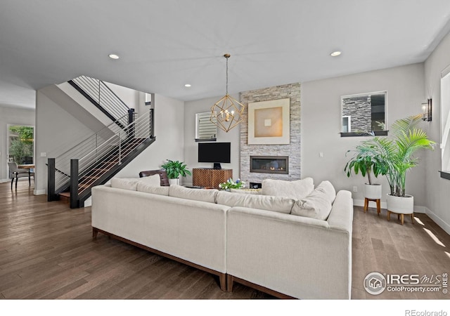 3663 Silverton St, Boulder, CO 80301 - living area featuring stairs, baseboards, recessed lighting, wood finished floors, and a chandelier