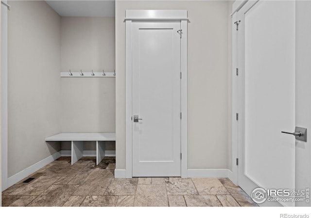 3663 Silverton St, Boulder, CO 80301 - mudroom with stone tile flooring and baseboards