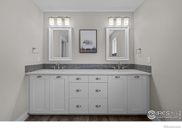 3663 Silverton St, Boulder, CO 80301 - full bathroom with double vanity and wood finished floors