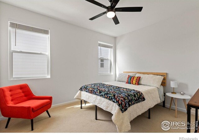 bedroom featuring baseboards, carpet, and a ceiling fan