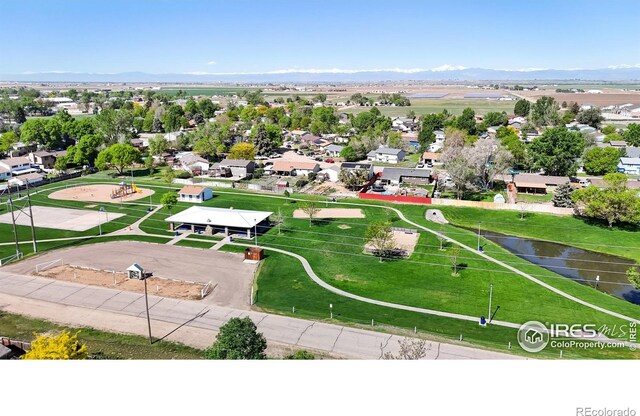 aerial perspective of suburban area featuring a mountain backdrop