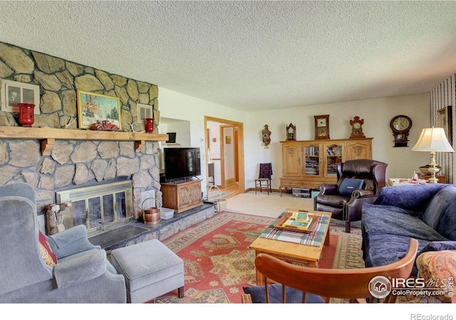 2219 Meadow Green Cir, Franktown, CO 80116 - carpeted living area featuring a textured ceiling and a stone fireplace