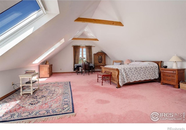 2219 Meadow Green Cir, Franktown, CO 80116 - bedroom featuring a skylight, lofted ceiling, and carpet floors