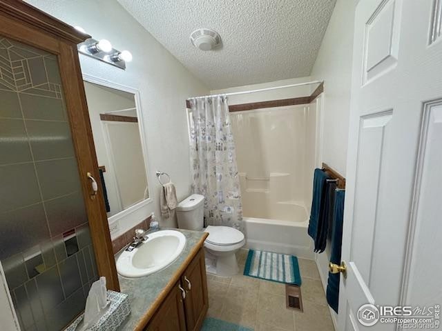 full bathroom featuring a textured ceiling, tile patterned flooring, vanity, shower / bath combo, and toilet