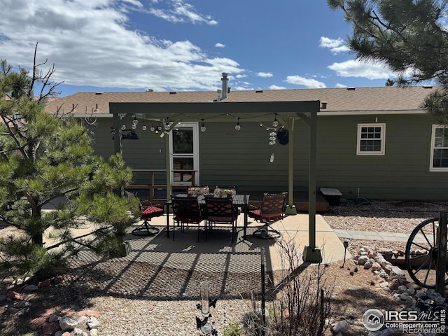 back of house featuring a patio
