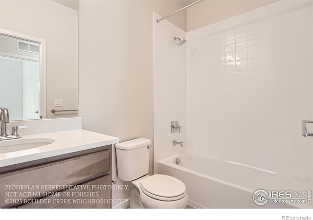 bathroom featuring toilet, vanity, and shower / bath combination