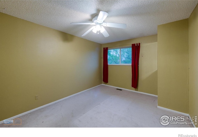 4140 Monroe Dr Unit C, Boulder, CO 80303 - carpeted empty room with ceiling fan, baseboards, and a textured ceiling