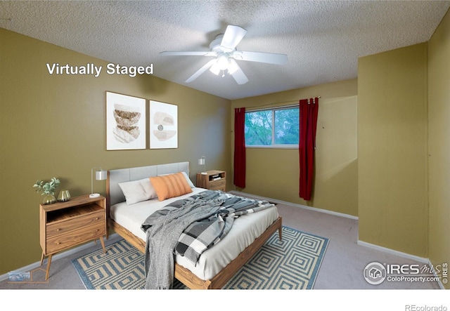 4140 Monroe Dr Unit C, Boulder, CO 80303 - bedroom featuring carpet floors, a textured ceiling, baseboards, and a ceiling fan