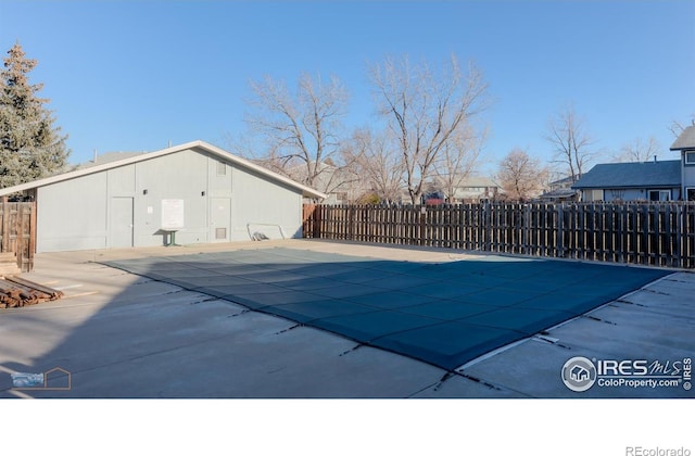4140 Monroe Dr Unit C, Boulder, CO 80303 - view of swimming pool featuring fence and a patio