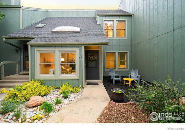93 Benthaven Pl, Boulder, CO 80305 - view of exterior entry featuring a shingled roof