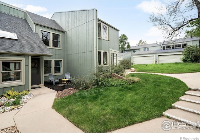 93 Benthaven Pl, Boulder, CO 80305 - view of home's exterior featuring a shingled roof and a lawn