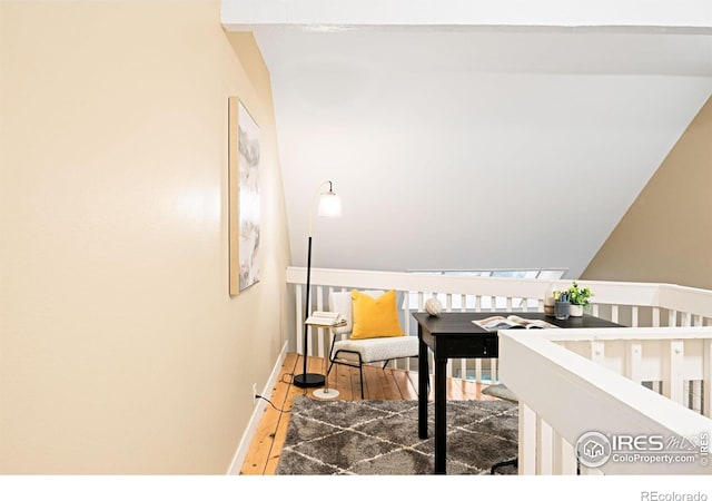 93 Benthaven Pl, Boulder, CO 80305 - bedroom with wood finished floors, baseboards, and vaulted ceiling