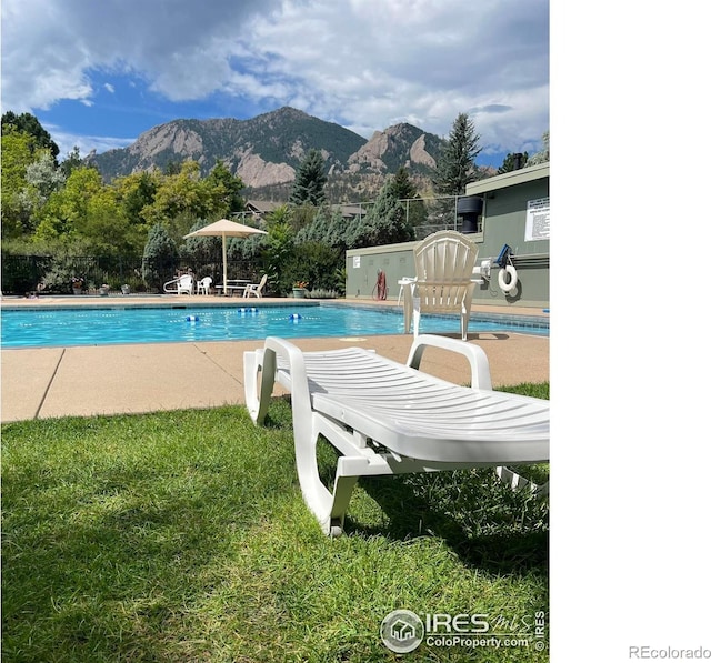 93 Benthaven Pl, Boulder, CO 80305 - community pool with a mountain view, fence, and a patio