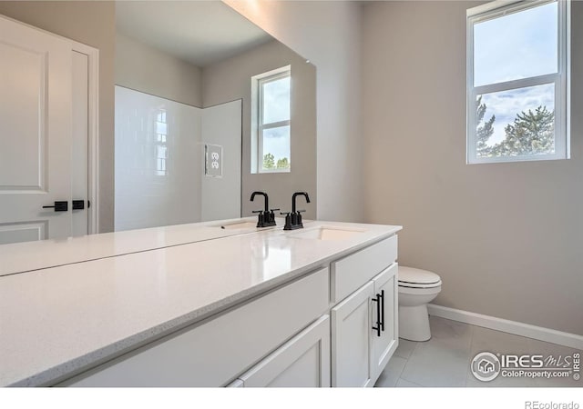 2710 Crystal Spgs, Longmont, CO 80503 - full bathroom with vanity and tile patterned flooring