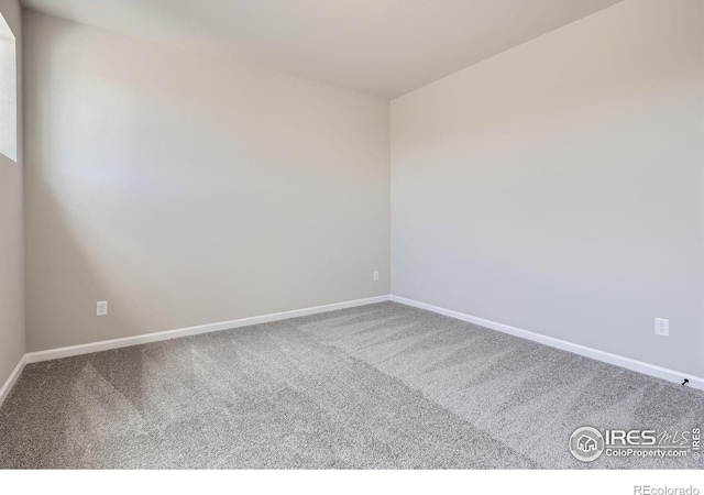 2710 Crystal Spgs, Longmont, CO 80503 - carpeted empty room featuring baseboards