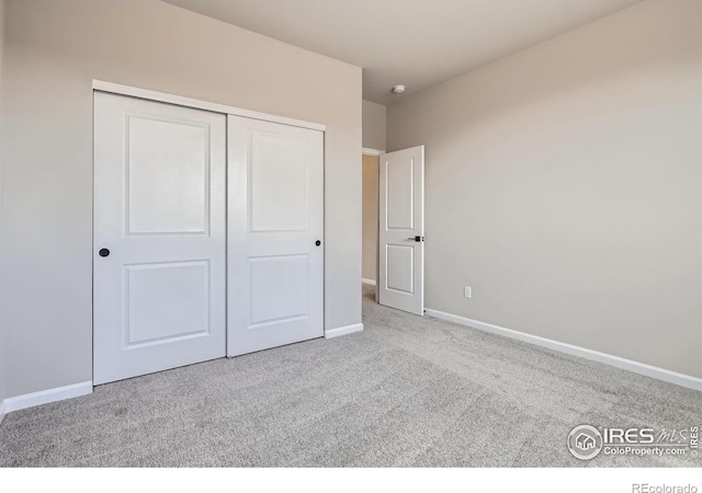 2710 Crystal Spgs, Longmont, CO 80503 - unfurnished bedroom with carpet and a closet