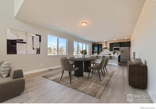 2710 Crystal Spgs, Longmont, CO 80503 - dining room with light wood-style floors and recessed lighting