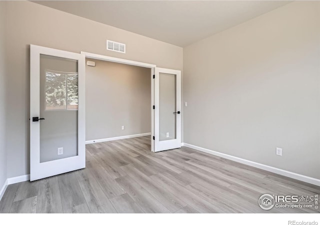 2710 Crystal Spgs, Longmont, CO 80503 - empty room featuring wood finished floors and french doors