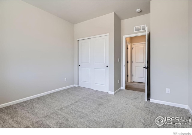 2710 Crystal Spgs, Longmont, CO 80503 - unfurnished bedroom featuring carpet floors and a closet