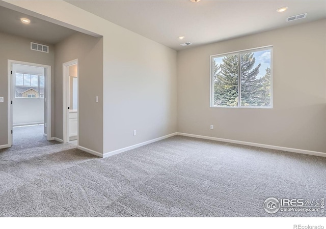 2710 Crystal Spgs, Longmont, CO 80503 - carpeted empty room with plenty of natural light and recessed lighting