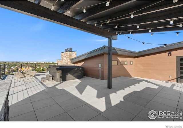 2123 Picture Point Dr, Windsor, CO 80550 - view of patio featuring a multi sided fireplace