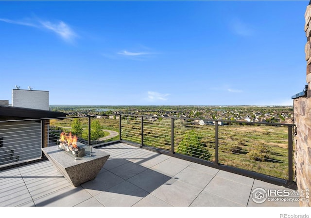 2123 Picture Point Dr, Windsor, CO 80550 - view of patio / terrace with an outdoor fire pit